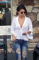 SELENA GOMEZ in Ripped Jeans Out in Los Angeles