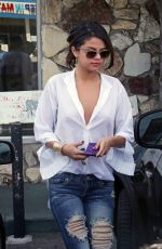 SELENA GOMEZ in Ripped Jeans Out in Los Angeles