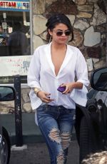 SELENA GOMEZ in Ripped Jeans Out in Los Angeles