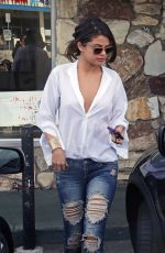SELENA GOMEZ in Ripped Jeans Out in Los Angeles