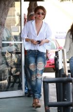SELENA GOMEZ in Ripped Jeans Out in Los Angeles