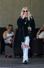 TAYLOR MOMSEN in Ripped Jeans Out in Miami