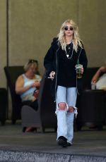 TAYLOR MOMSEN in Ripped Jeans Out in Miami