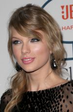TAYLOR SWIFT at 2014 Pre-Grammy Gala in Beverly Hills