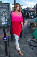 TRICIA HELFER on the Set of Extra at Universal Studios