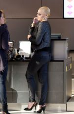 ABBIE CORNISH at LAX Airport in Los Angeles