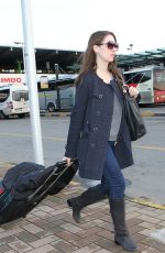 ALISON BRIE at the Bus Station in Milan