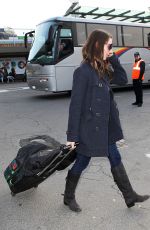 ALISON BRIE at the Bus Station in Milan