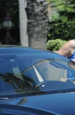 ALYSON HANNUGAN and Her Tesla Electric Car in Santa Monica 02-19-2014