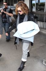 ALYSSA MILANO and Her Pillows at LAX Airport