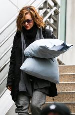 ALYSSA MILANO and Her Pillows at LAX Airport