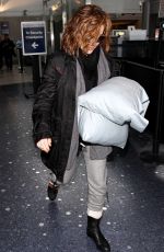 ALYSSA MILANO and Her Pillows at LAX Airport