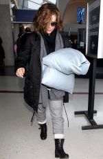 ALYSSA MILANO and Her Pillows at LAX Airport