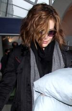 ALYSSA MILANO and Her Pillows at LAX Airport