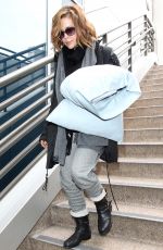 ALYSSA MILANO and Her Pillows at LAX Airport