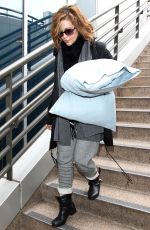 ALYSSA MILANO and Her Pillows at LAX Airport