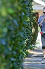 AMANDA SEYFRIED on the Morning Walk with Her Dog
