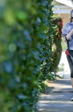 AMANDA SEYFRIED on the Morning Walk with Her Dog