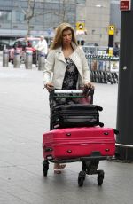 AMY WILLERTON at Heathrow Airport in London
