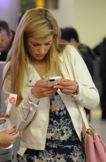 AMY WILLERTON at Heathrow Airport in London