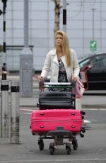 AMY WILLERTON at Heathrow Airport in London