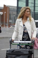 AMY WILLERTON at Heathrow Airport in London