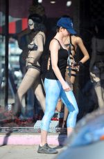 ANNE HATHAWAY in Tights Out and About in Los Angles