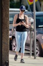 ANNE HATHAWAY in Tights Out and About in Los Angles