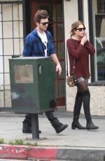 ASHLEY BENSON in Knee High Boots Out Shopping in Hollywood