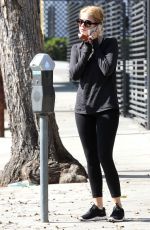 ASHLEY BENSON in Tights Leaves a Gym in Los Angeles