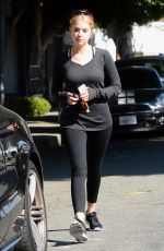 ASHLEY BENSON in Tights Leaves a Gym in Los Angeles