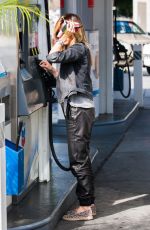 ASHLEY TISDALE at a Gas Station in Studio City