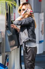 ASHLEY TISDALE at a Gas Station in Studio City