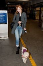 BELLA THORNE and Her Dog Kingston at LAX Airport