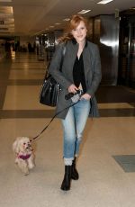 BELLA THORNE and Her Dog Kingston at LAX Airport