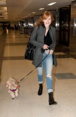 BELLA THORNE and Her Dog Kingston at LAX Airport
