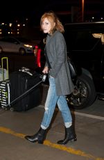 BELLA THORNE and Her Dog Kingston at LAX Airport