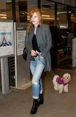 BELLA THORNE and Her Dog Kingston at LAX Airport