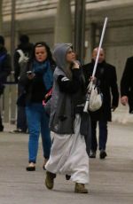 CARA DELEVINGNE and MICHELLE RODRIGUEZ at Paddington Station in London