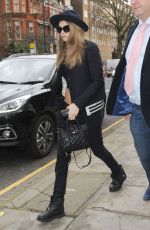 CARA DELEVINGNE Arrives at Burberry Fashion Show in London