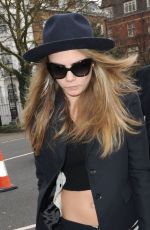CARA DELEVINGNE Arrives at Burberry Fashion Show in London