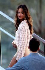 CHRISSY TEIGEN in Shorts Out and About in Miami