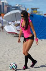 CLAUDIA ROMANI Playing Soccer on the Beach in Miami