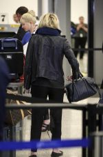 DAKOTA FANNING at LAX AIrport in Los Angeles