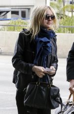 DAKOTA FANNING at LAX AIrport in Los Angeles