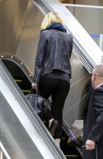 DAKOTA FANNING at LAX AIrport in Los Angeles
