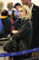 DAKOTA FANNING at LAX AIrport in Los Angeles