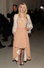 DAKOTA FANNING at Rodarte Fashion Show in New York
