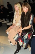DAKOTA FANNING at Rodarte Fashion Show in New York