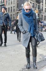 DAKOTA FANNING in Leather Pant Out and About in New York